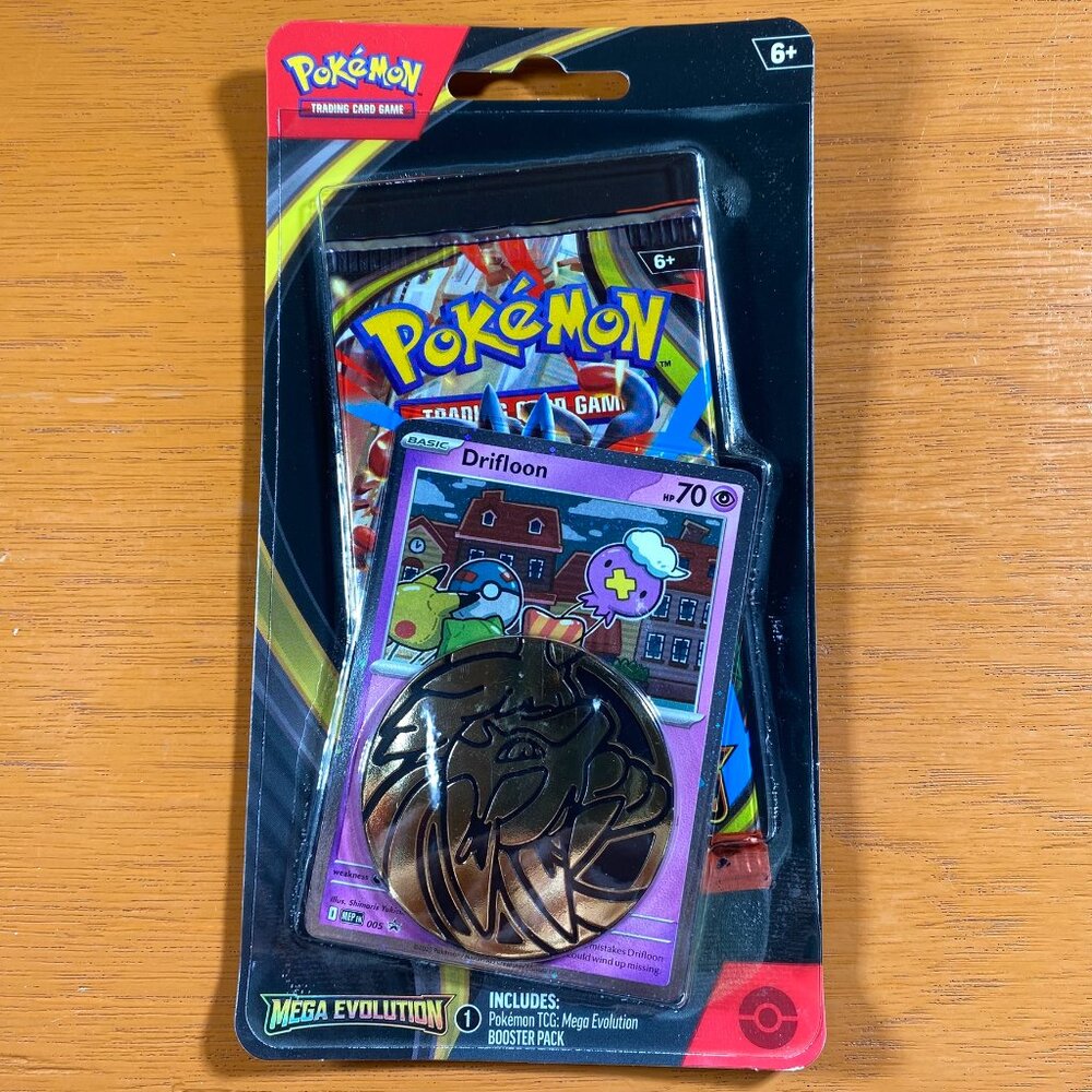 Pokémon TCG Mega Evolution Blister Pack Drifloon With Coin Booster